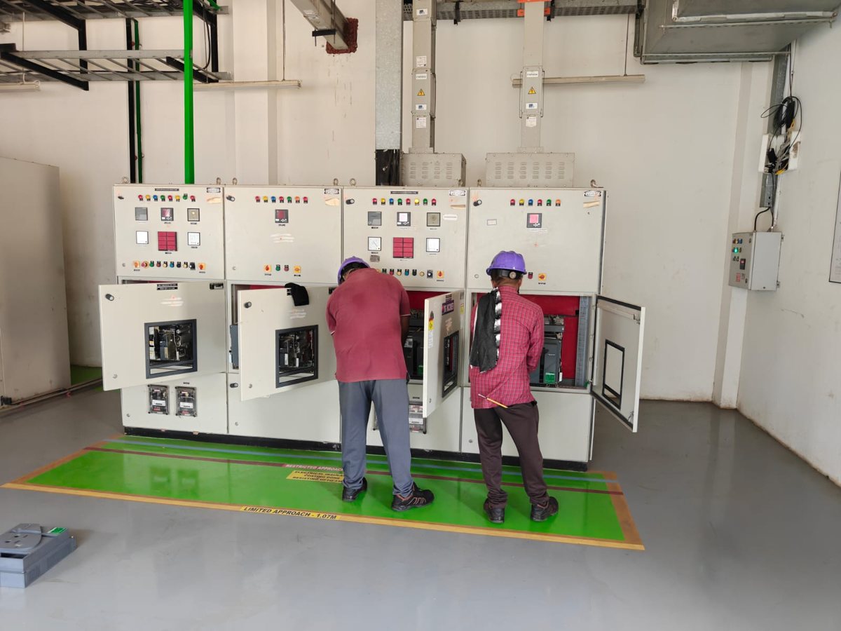 VM Electrical technicians servicing an HT panel