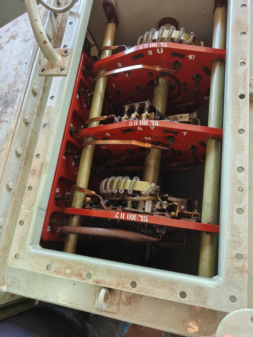 Technicians servicing HT panel